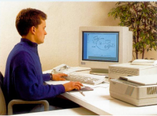 Hendrik Witzel am Computerarbeitsplatz im Jahr 1987 beim Einstieg ins Familienunternehmen